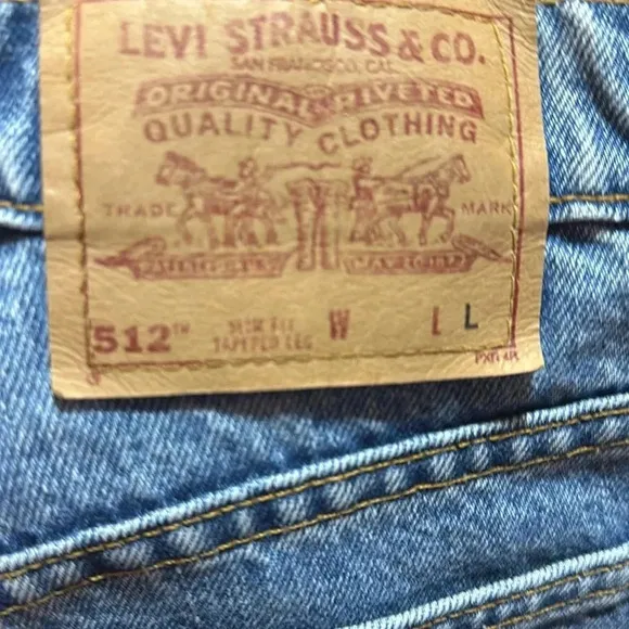 Vintage Levi’s 512 High Rise Slim Fit Tapered Leg Jeans, Light wash